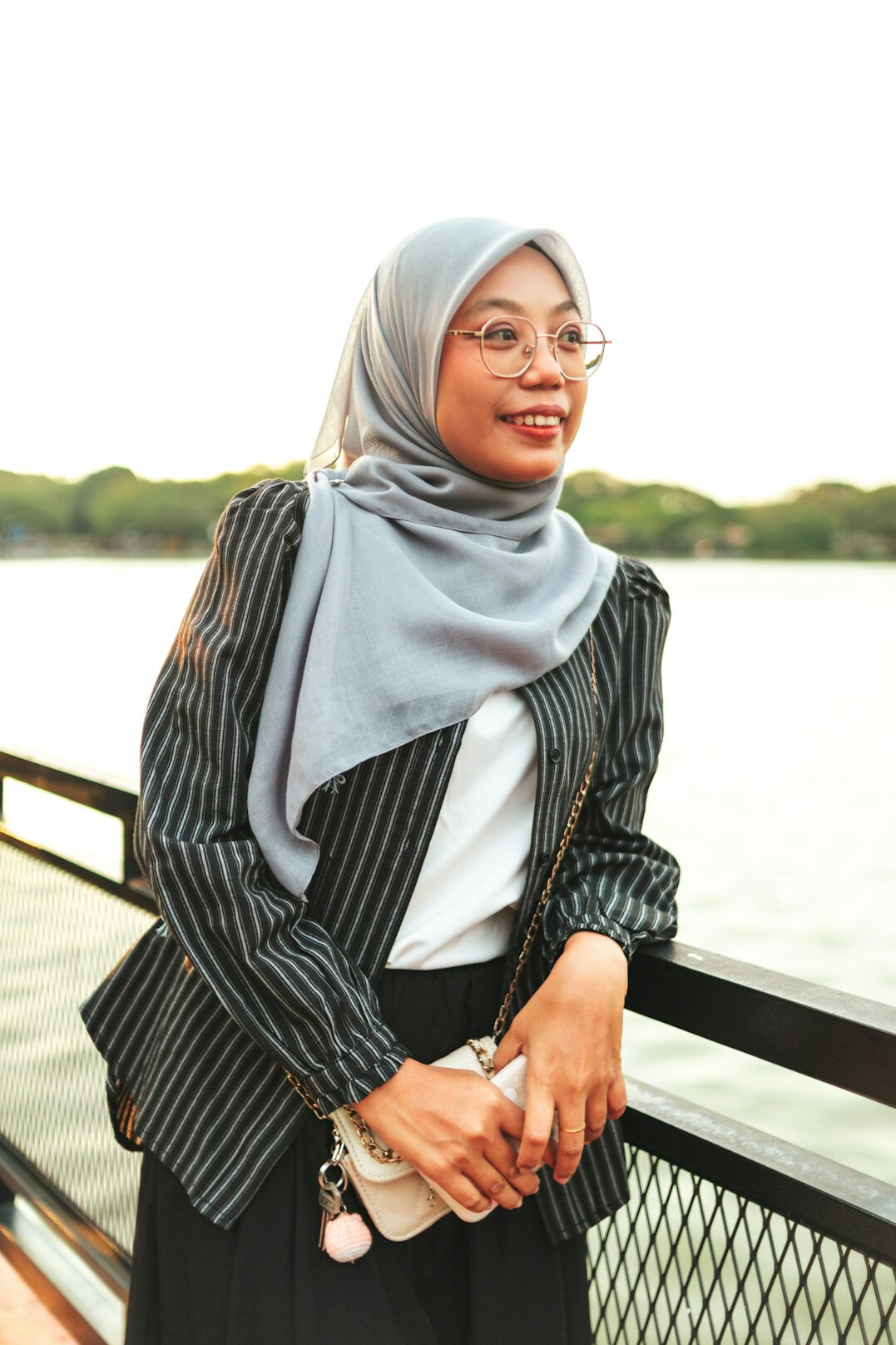 Studio portrait of a Malaysian-Chinese businesswoman in a blazer
